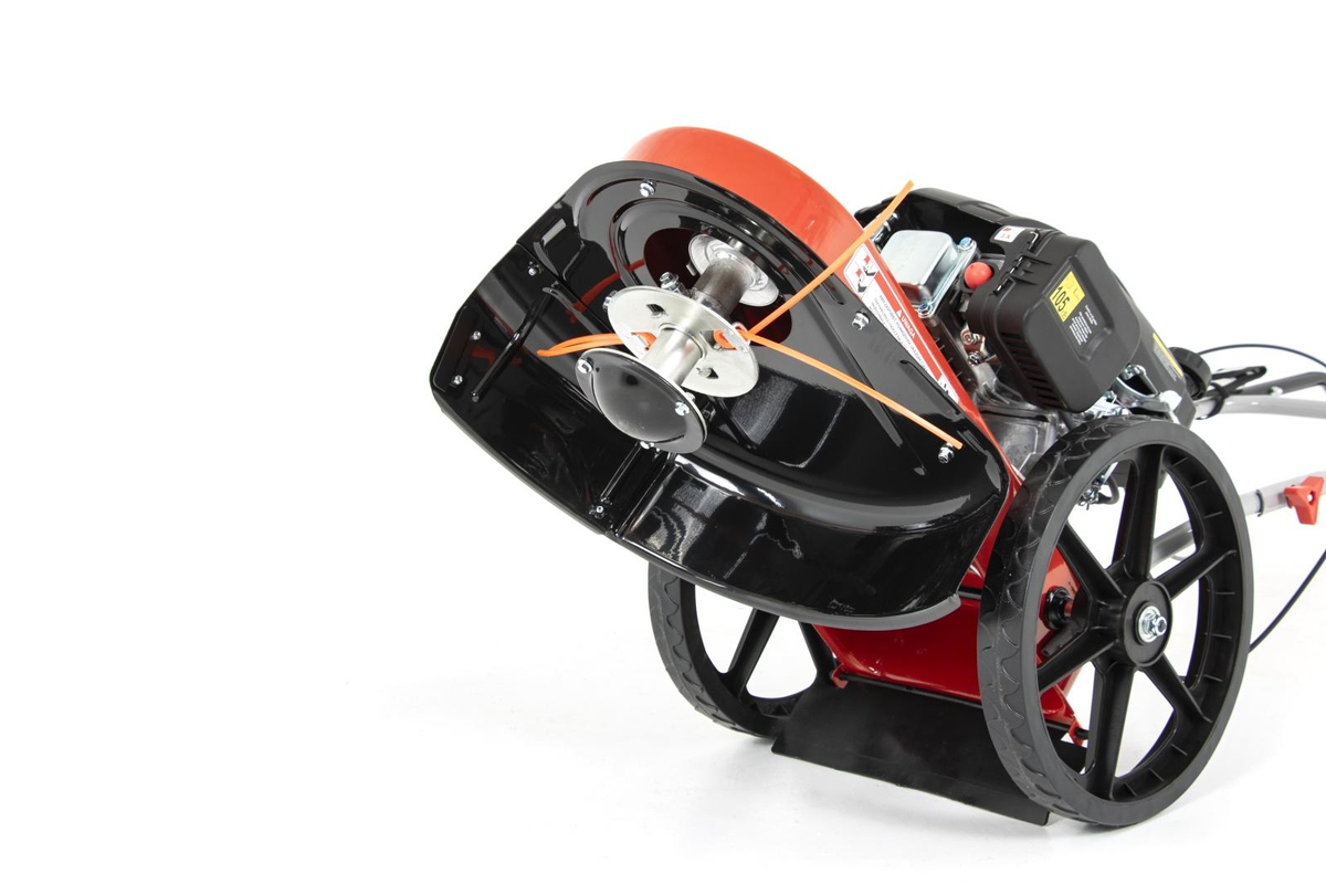 Głowica bębnowa z żyłką tnącą w kosiarce FAWORYT DK560C